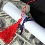 Graduation-hat-and-scroll-on-money